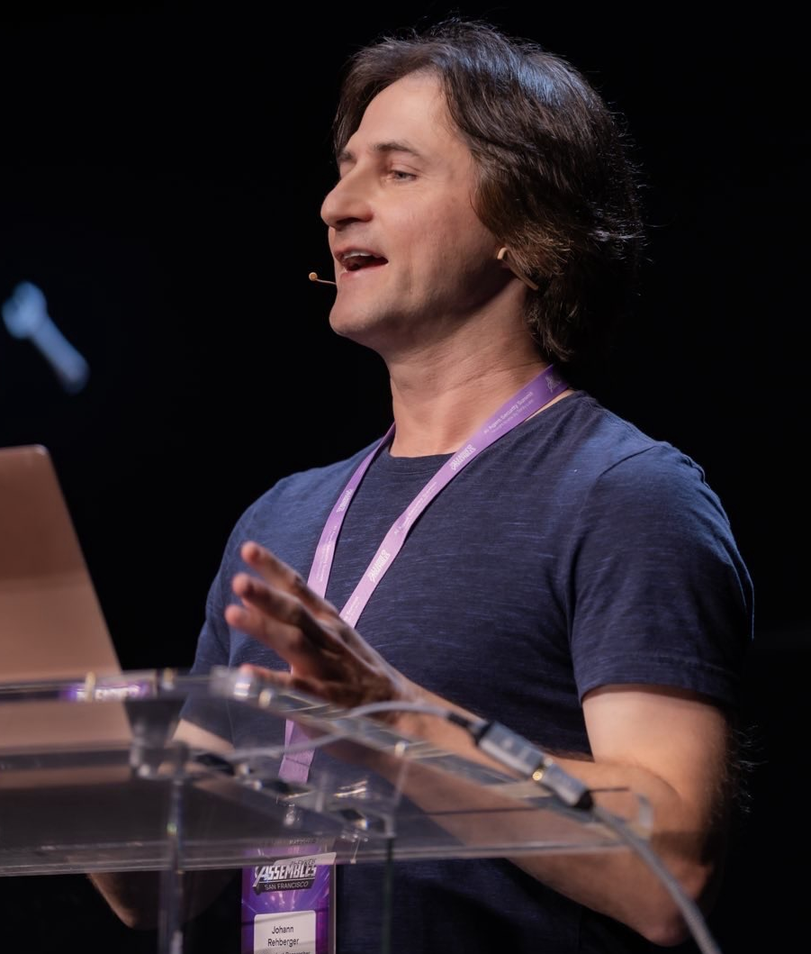 Johann Rehberger speaking on stage